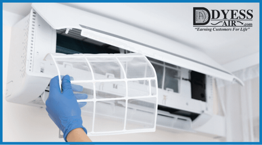 Technician Replacing Air filter